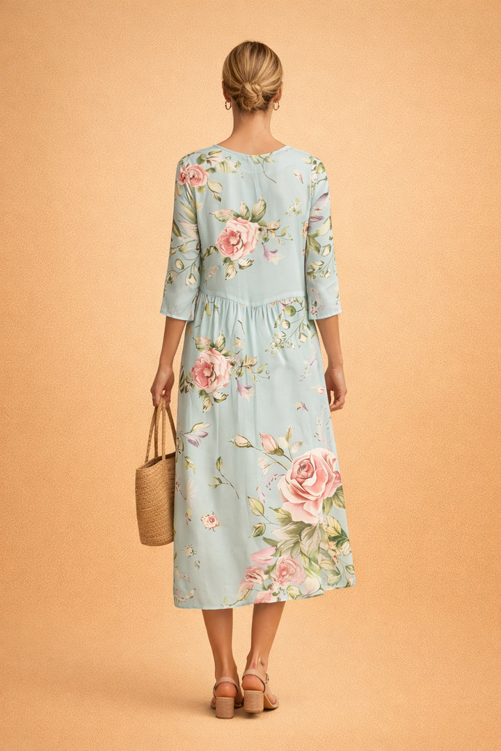 Versatile women's floral midi dress, ideal for casual summer style or elegant event wear. Relaxed fit.