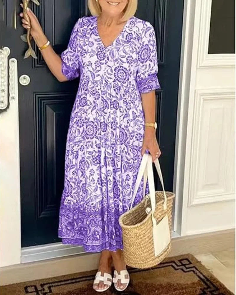 Casual yet stylish women's V-neck floral midi dress, offering an airy feel for everyday summer wear.
