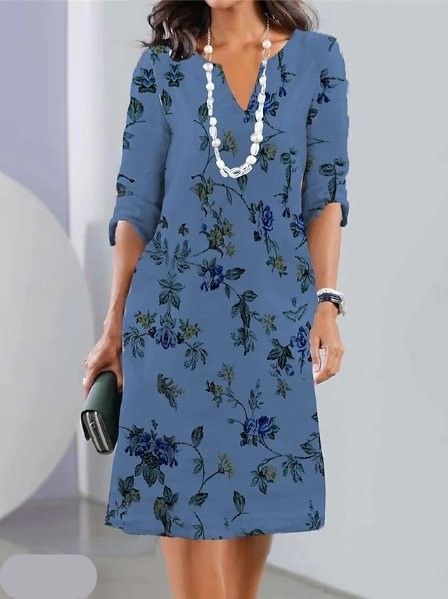 Chic short sleeve floral midi dress for women with a flattering A-line cut and round neck, a spring fashion essential.