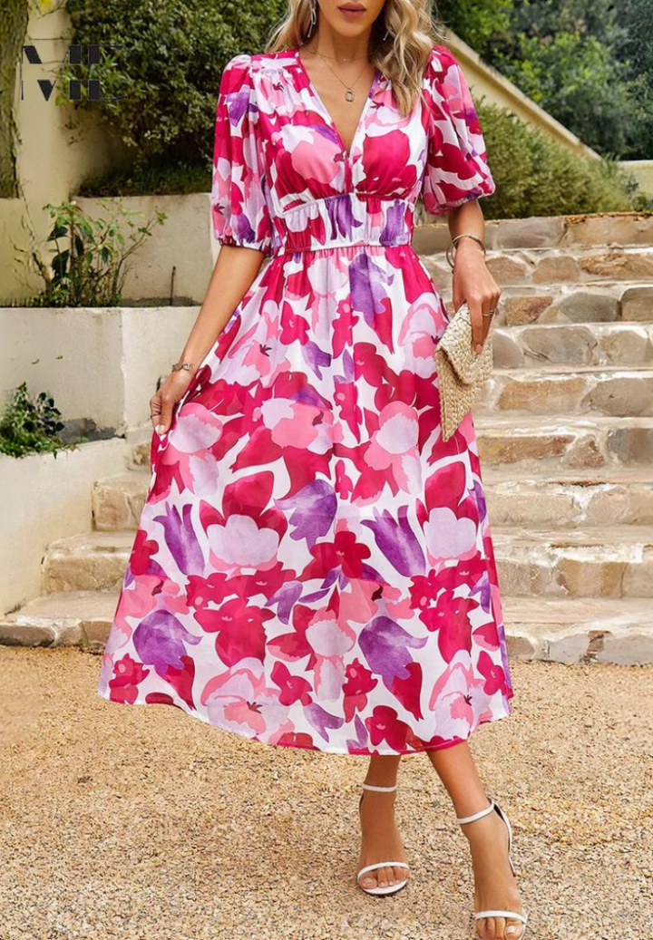 Feminine women's elegant floral midi dress, a chic look with puff sleeves for any season.