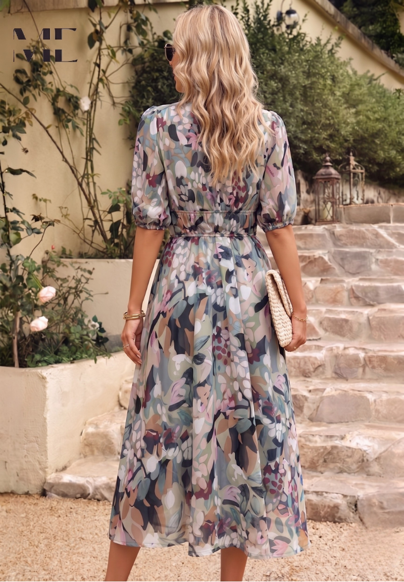 Women's vibrant floral midi dress featuring stylish puff sleeves, perfect for summer.