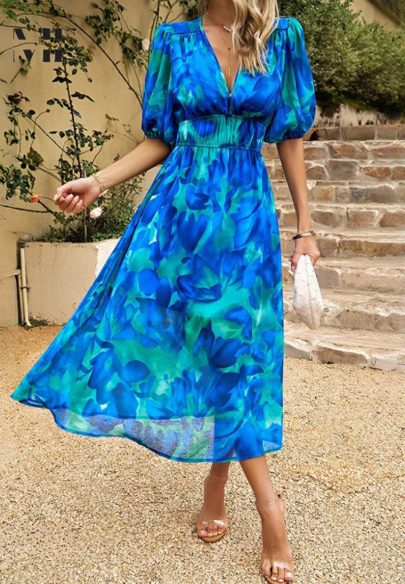 Elegant women's occasion dress, a floral midi style with fashionable puff sleeves.