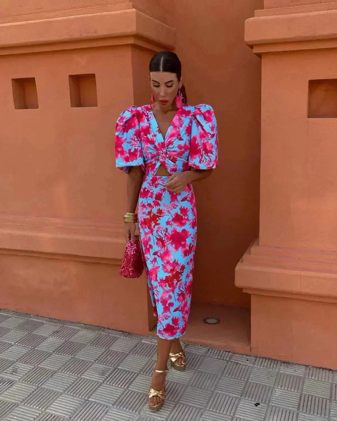Elegant women's floral midi dress with puff sleeves, V-neck, and cut-out waist, perfect for summer weddings.