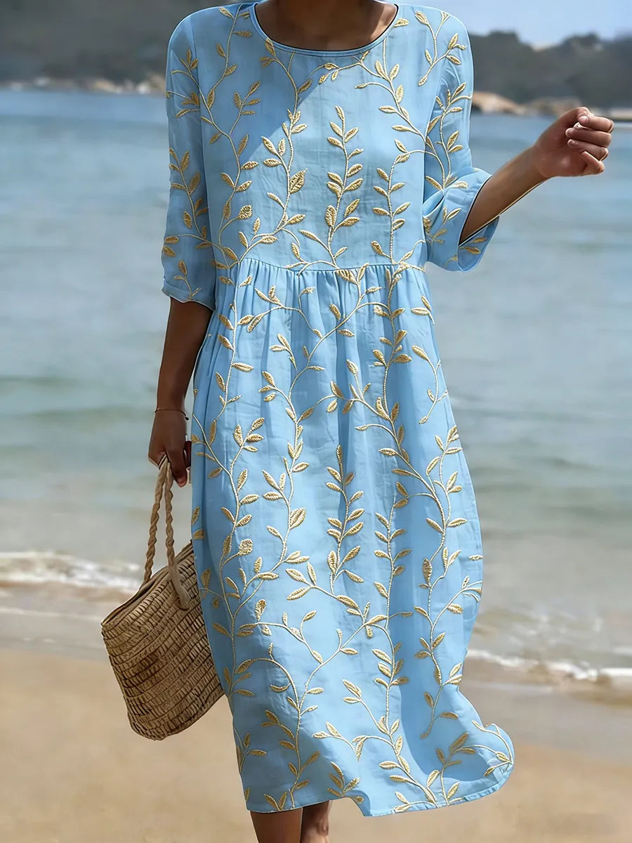 Elegant women's floral midi dress with round neck, perfect for day, evening, summer, or spring occasions.