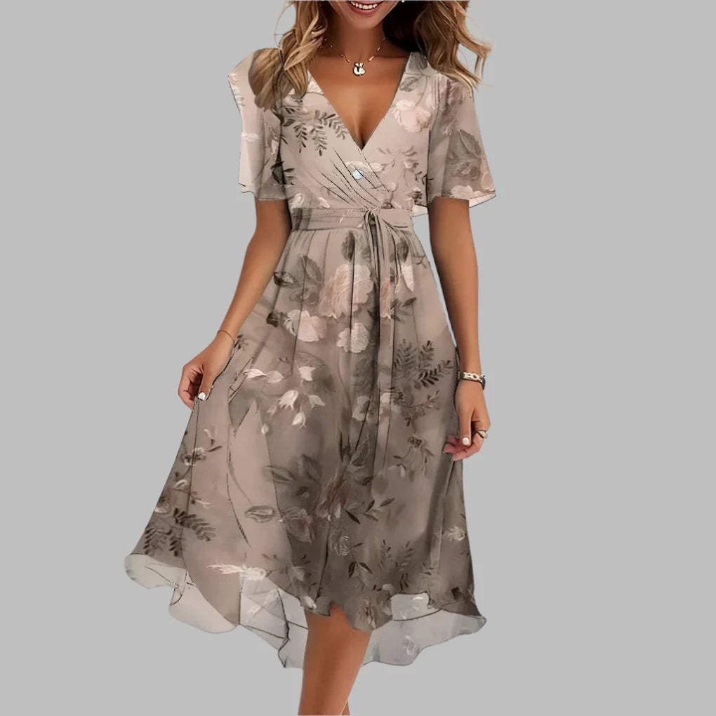 Stylish women's floral ruched midi dress with puff sleeves & flattering silhouette. Ideal for parties & spring events.