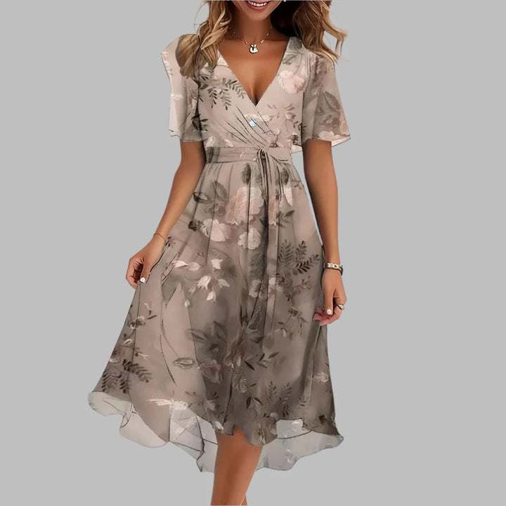 Stylish women's floral ruched midi dress with puff sleeves & flattering silhouette. Ideal for parties & spring events.
