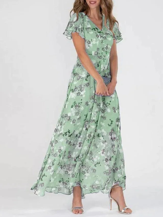 Feminine floral short sleeve midi dress for women, offering an elegant look for spring fashion & summer gatherings.