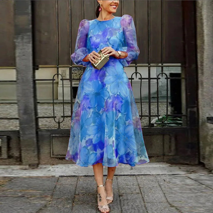 Sophisticated floral midi dress for women, ideal as a wedding guest or special occasion party dress.