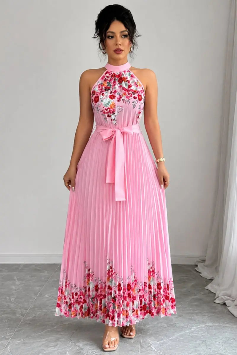 Elegant women's floral pleated halter-neck maxi gown for evening wear & summer parties.