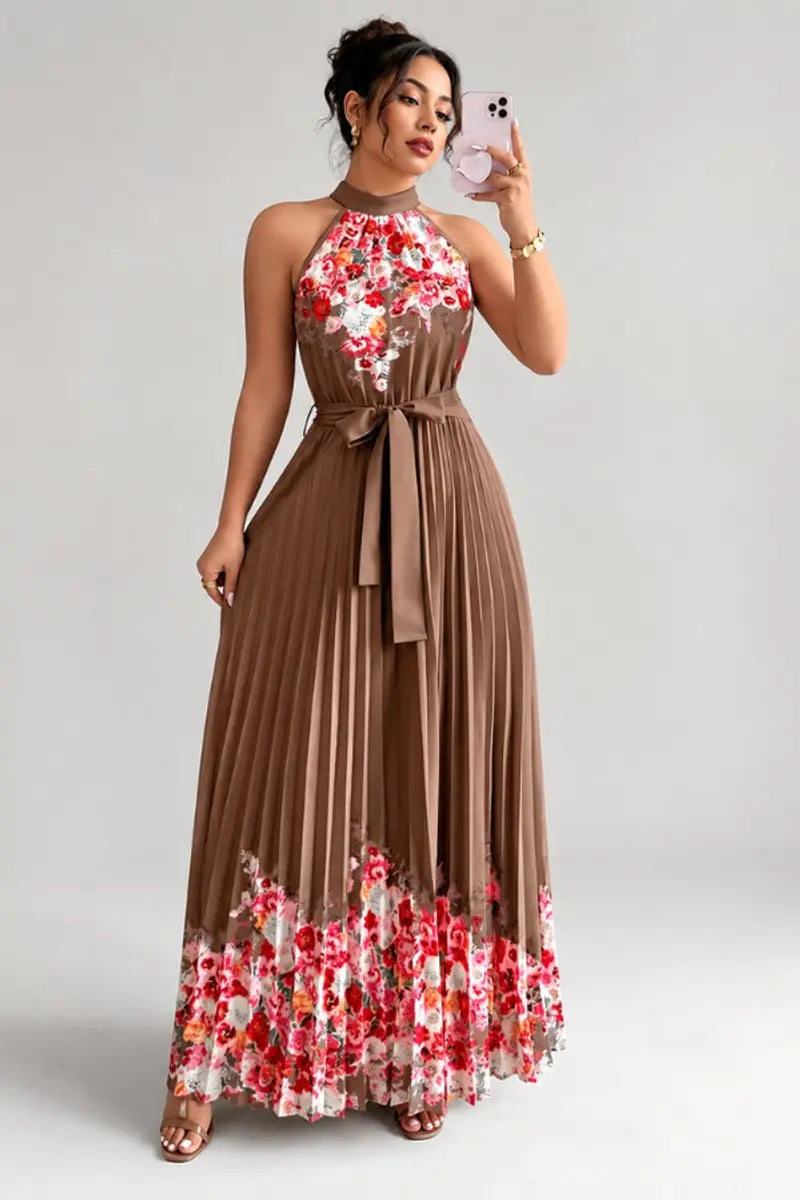 Sophisticated floral pleated halter maxi dress for women, perfect for formal occasions.
