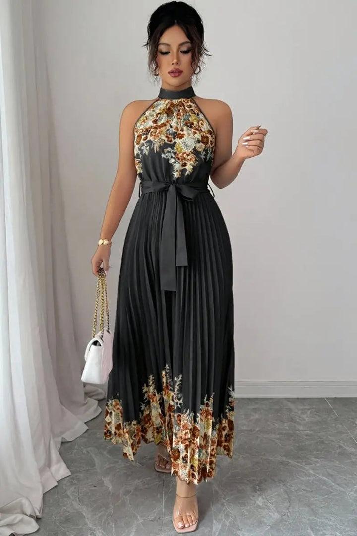 Graceful women's floral pleated halter maxi gown, an elegant choice for evening and formal wear.
