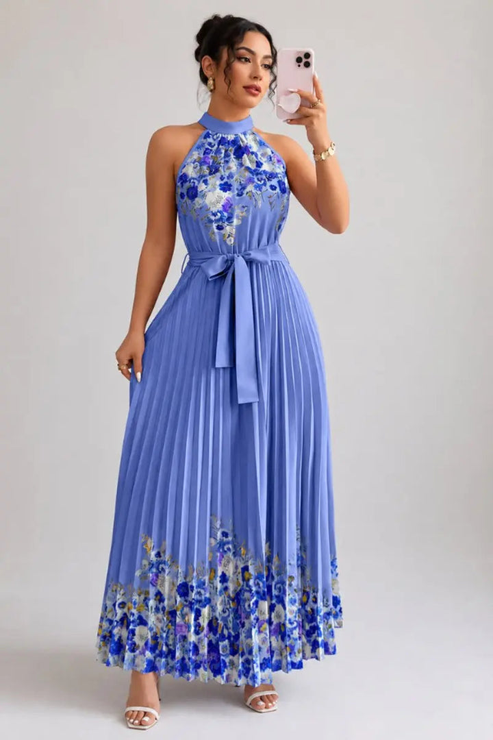 Stylish women's floral pleated halter maxi gown, ideal for formal parties & sophisticated events.