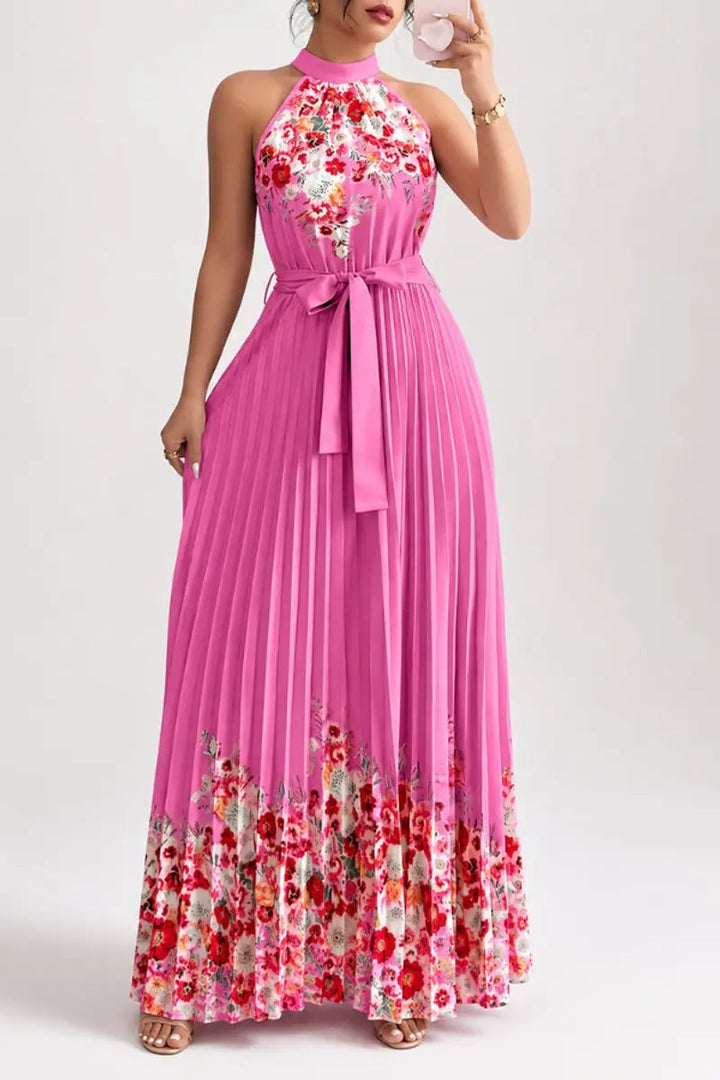 Beautiful floral pleated halter-neck maxi gown for women, perfect for summer & wedding guests.