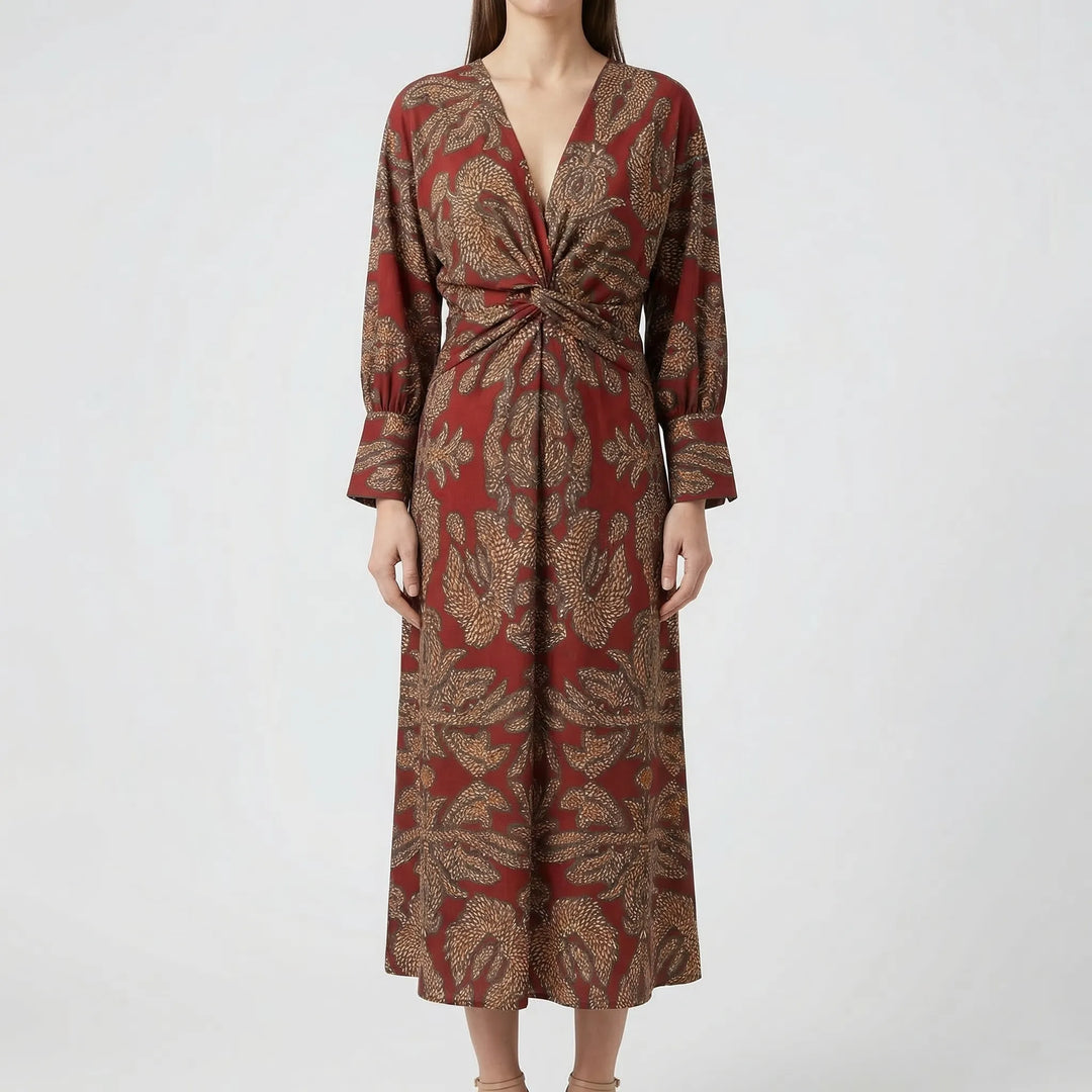 Printed elegant women's A-line midi dress with long sleeves & floral pattern, a fashionable choice for special events.