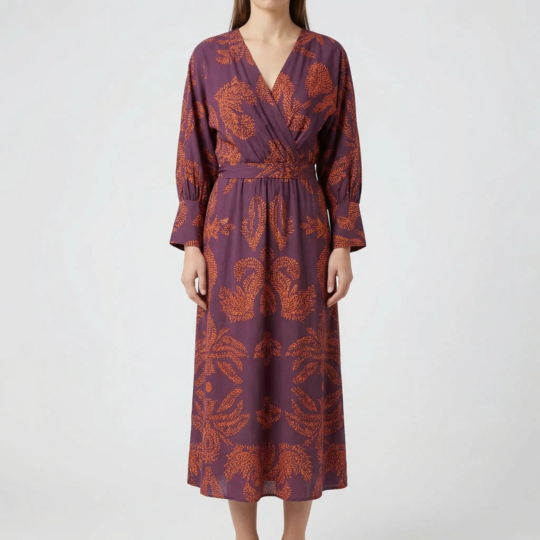 Full length view of a beautiful floral midi dress for women, an elegant A-line style suitable for evening wear.