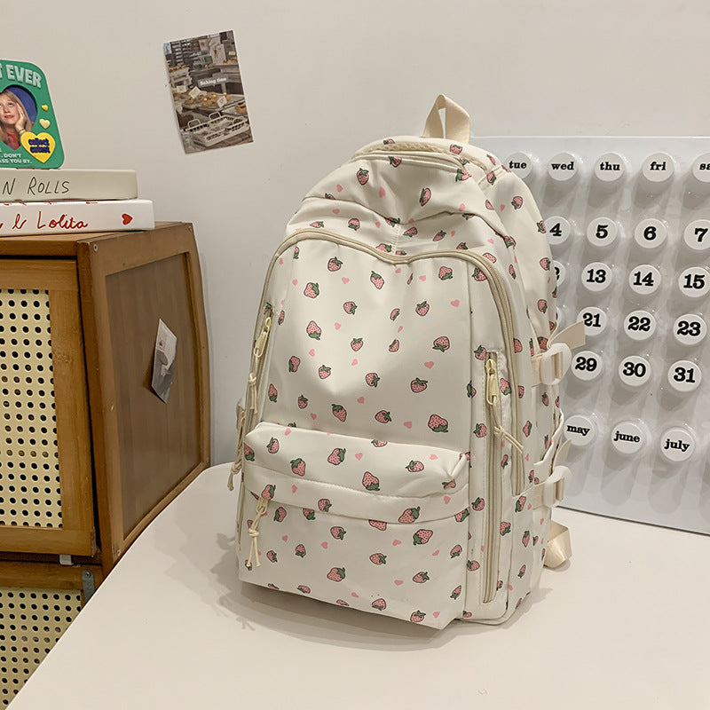 Close-up of a stylish women's floral print backpack, highlighting vibrant pattern & durable design.