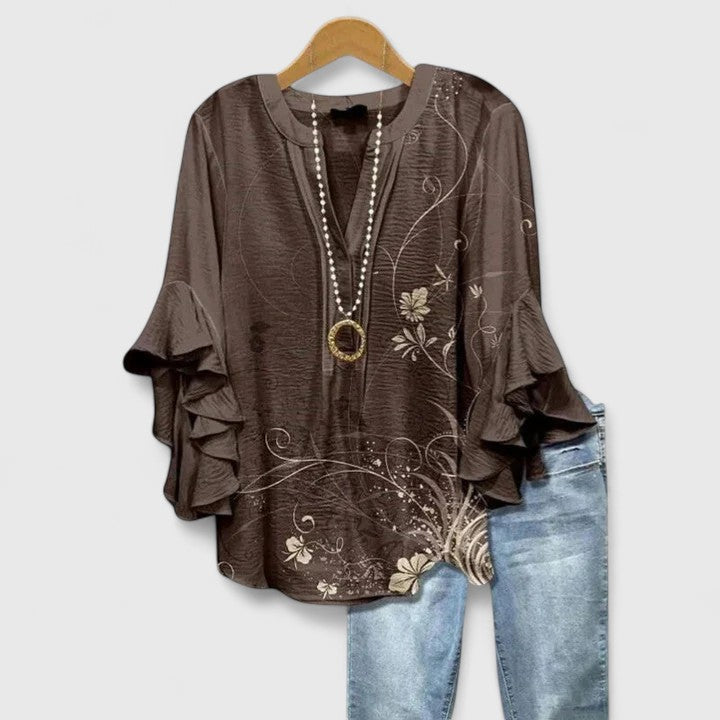 Beautiful women's floral print blouse, elegant ruffle sleeves. Perfect casual dressy spring/summer outfit.