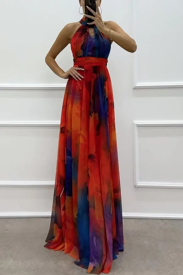 Stunning Pink Floral Halter Maxi Dress with elegant cutouts & flowy skirt. Great for evening wear & special occasions.