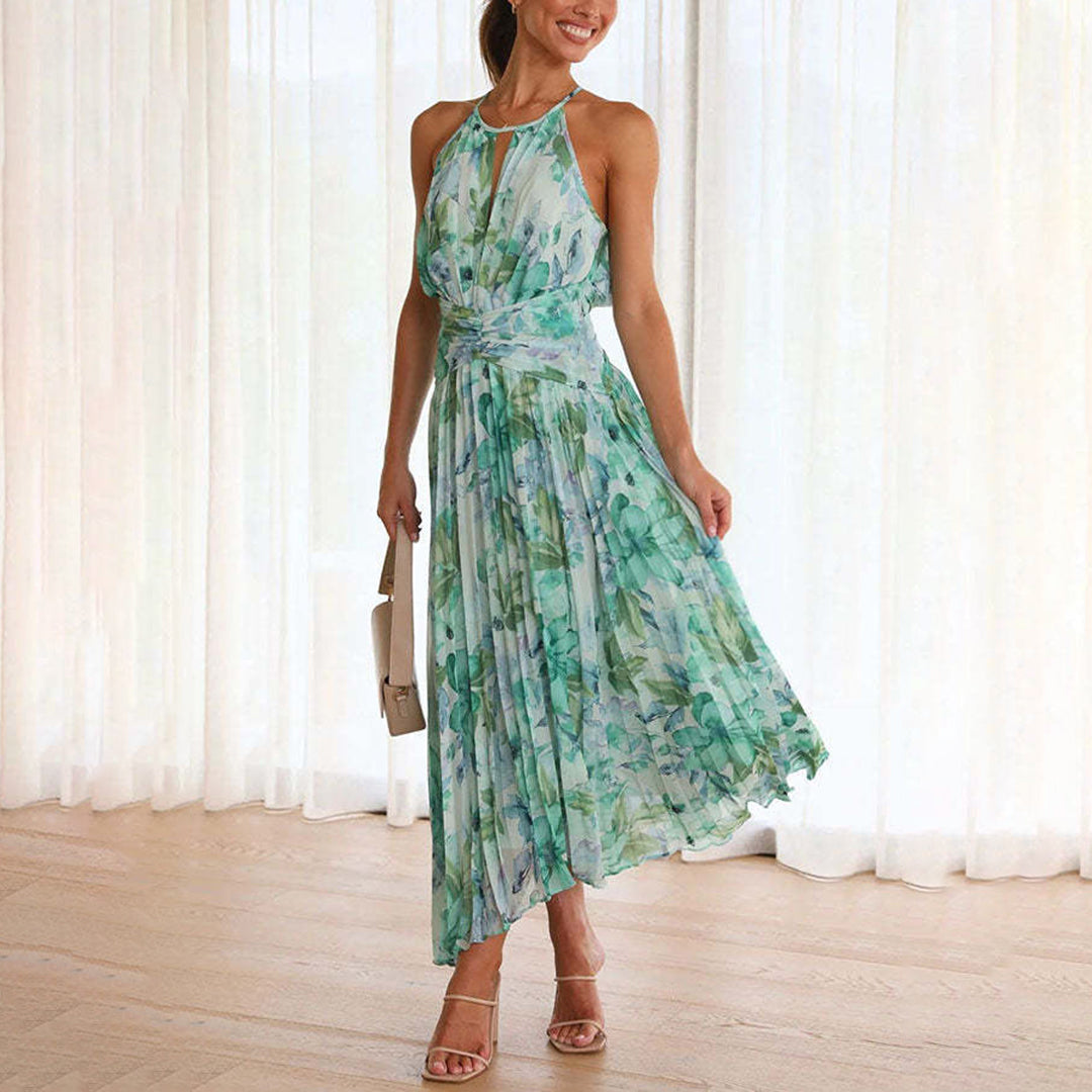 Elegant women's floral print maxi dress, perfect for summer vacations. Breezy, flowy design.