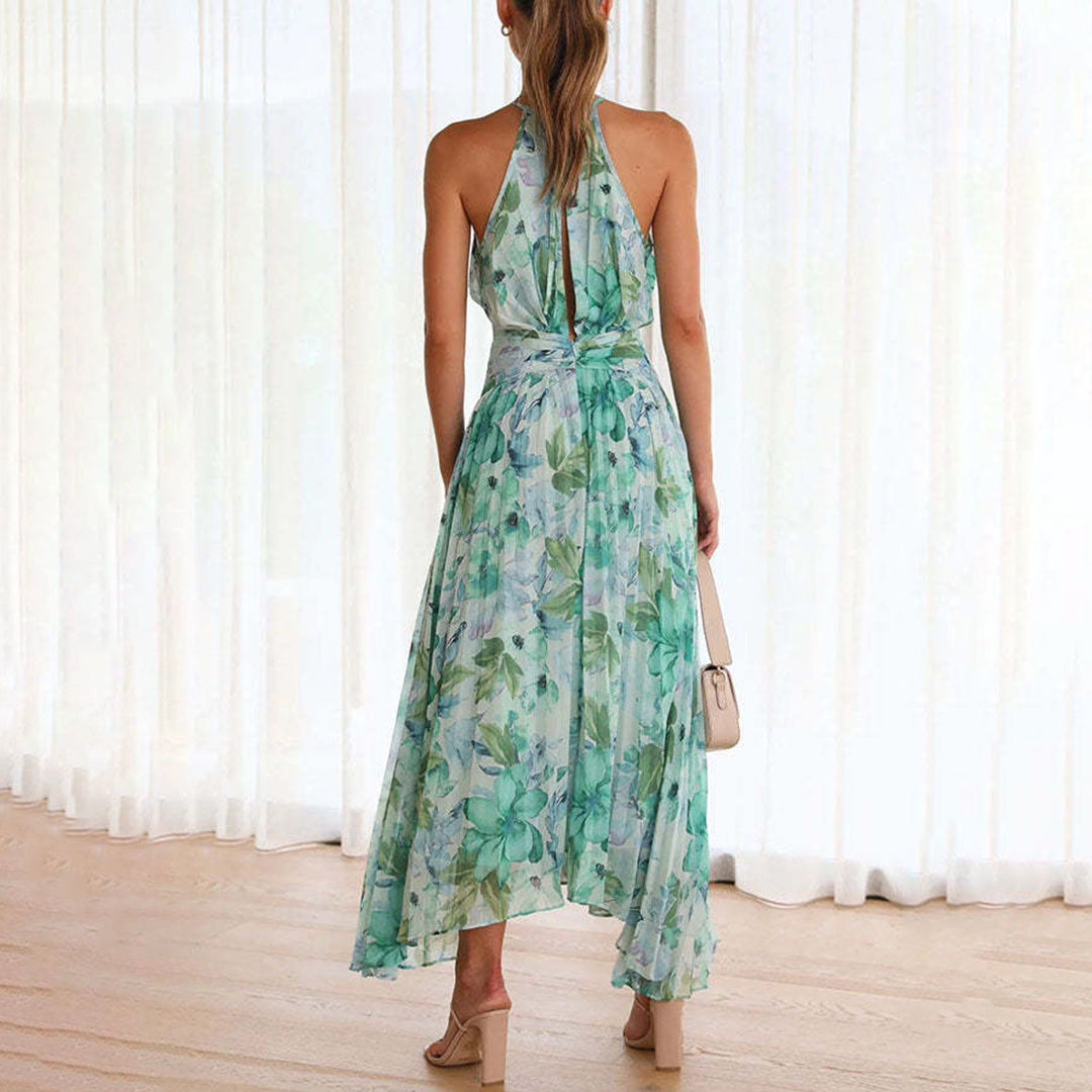 Flowy floral maxi dress for women, ideal for breezy summer days or elegant vacation wear.