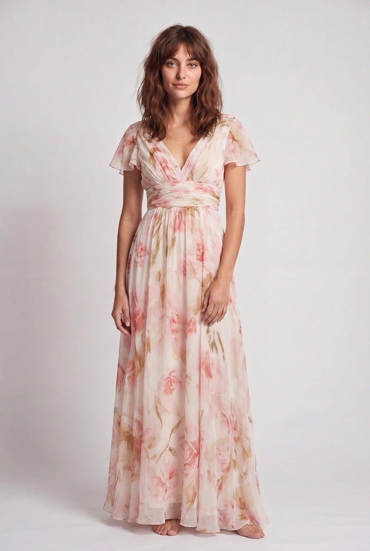 Flowing women's V-neck maxi dress featuring a vibrant floral print, ideal for romantic summer wear.
