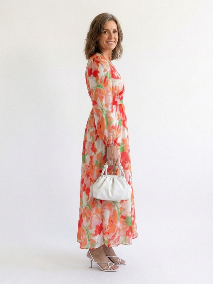 Vibrant floral print women's maxi dress with elegant long sleeves, perfect for spring/summer.