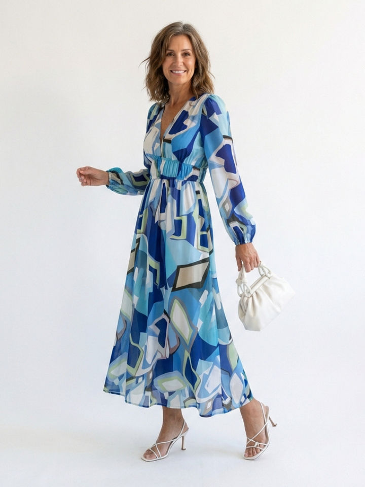 Elegant women's long-sleeve maxi dress in a flattering floral print, flowy & comfortable.