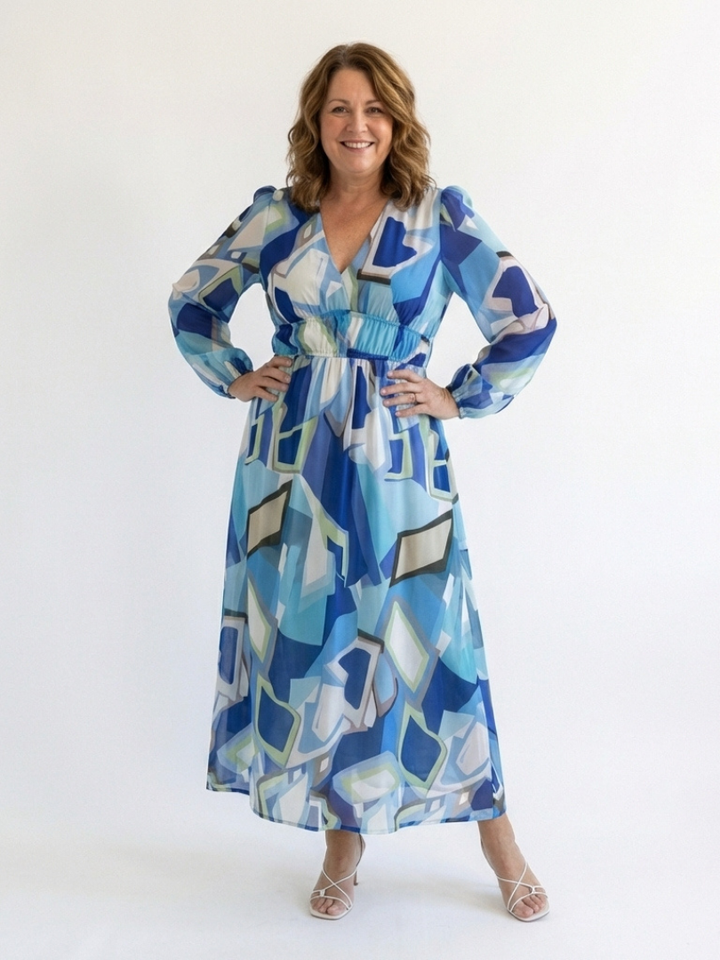 Soft, flowy women's floral maxi dress with long sleeves, elegant and comfortable for any occasion.