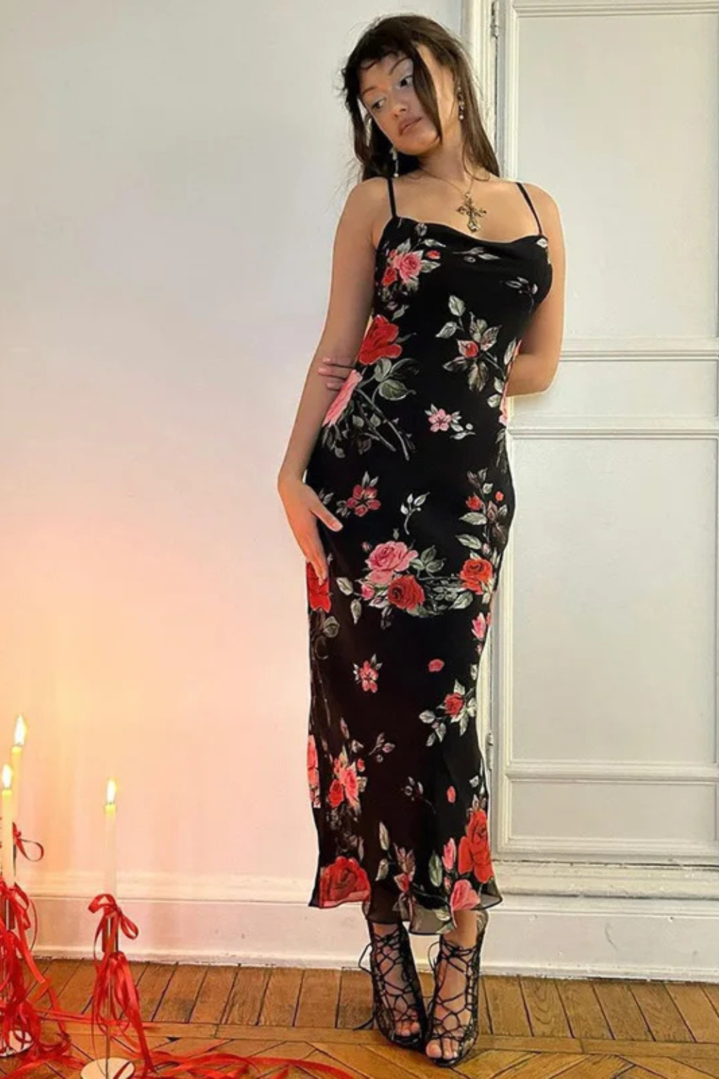 Sleeveless floral maxi dress for women featuring delicate spaghetti straps, ideal for summer weddings & events.