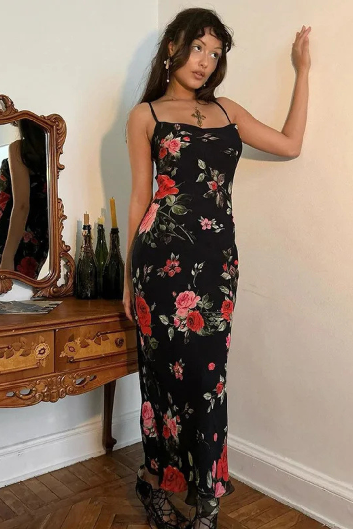 Lightweight women's floral maxi dress, spaghetti strap design for cool, comfortable summer fashion.
