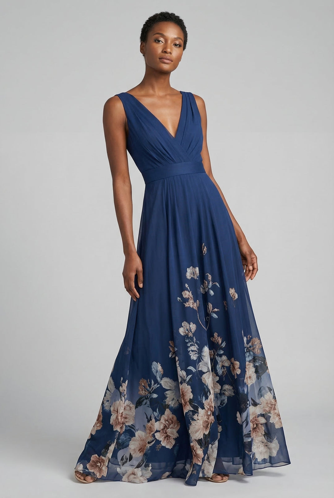 Stylish v-neck floral print dress with an empire waist, ideal for any occasion.