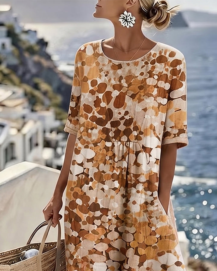 Elegant women's floral midi dress with pockets, ideal for casual elegant spring/summer style.