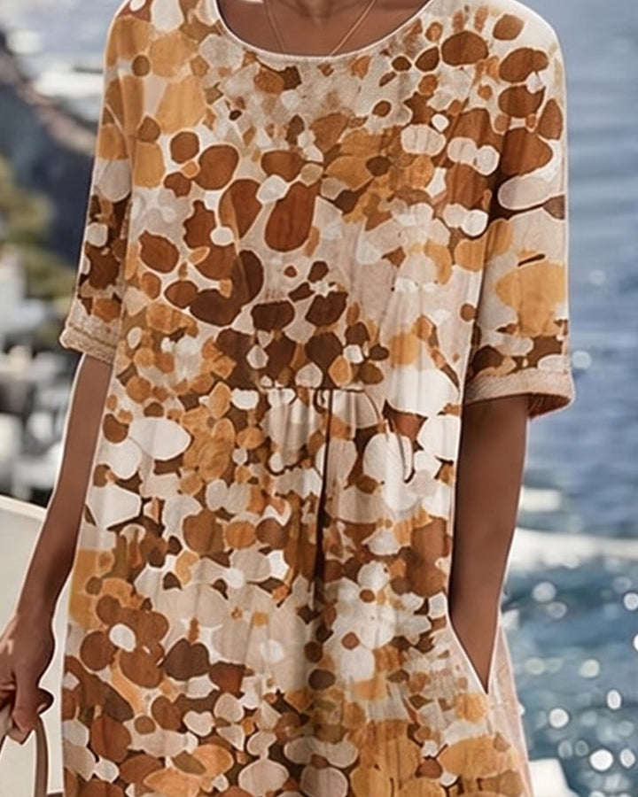 Floral print women's short sleeve midi dress, round neck, A-line silhouette, with side pockets.