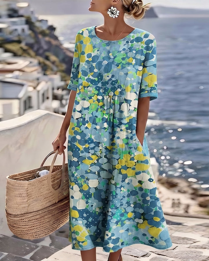 Casual elegant women's summer dress, floral print midi with convenient pockets and short sleeves.