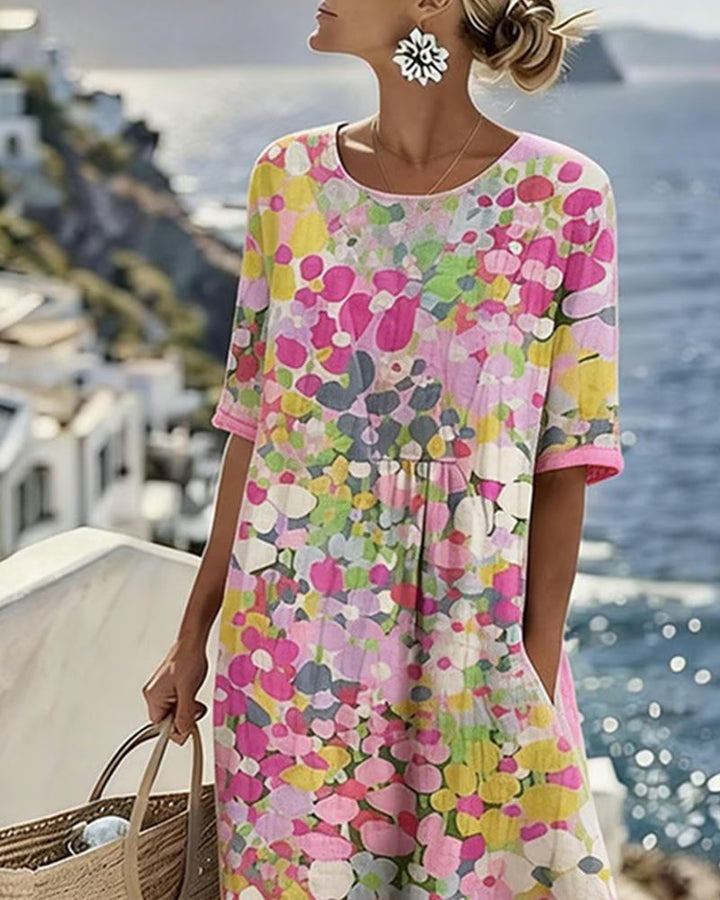 Stylish women's floral midi dress with round neck, short sleeves, and pockets for versatile wear.
