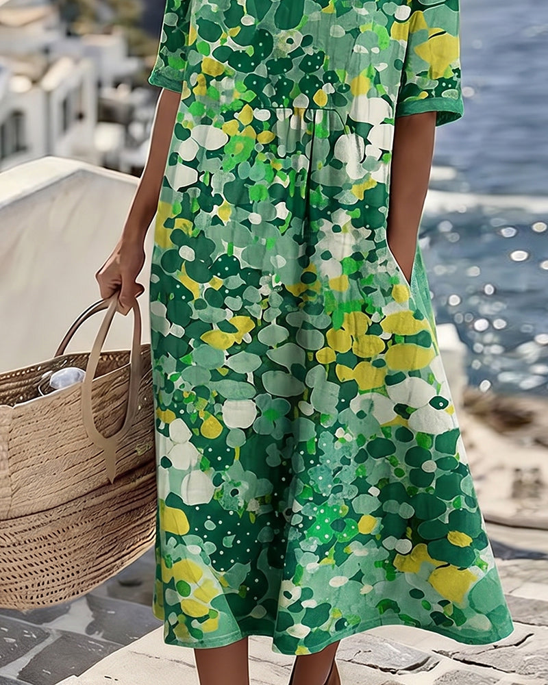 Women's floral print midi dress, short sleeve, round neck, pockets, ideal for spring fashion.
