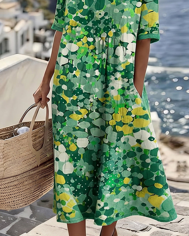 Women's floral print midi dress, short sleeve, round neck, pockets, ideal for spring fashion.