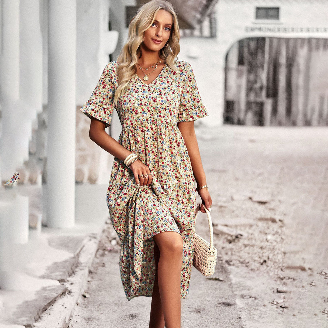 Elegant women's floral print midi dress with V-neck & short sleeves, perfect for summer parties or vacation. Chic style.