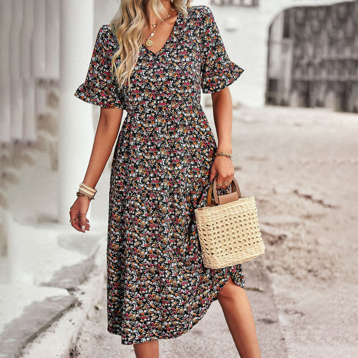 Chic floral print midi dress for women, ideal for summer casual wear, spring outings, or daytime events. V-neck style.