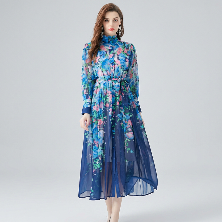 Women's spring/summer elegant floral sheer maxi dress with long sleeves, button front, & flattering tie waist.