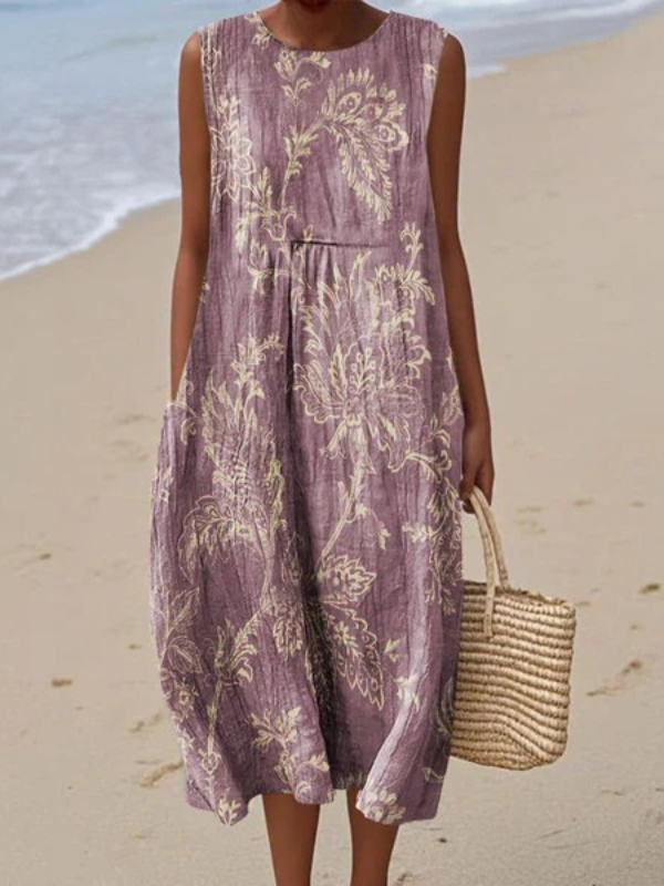 Elegant women's floral sleeveless midi dress for summer. Comfortable & versatile for casual or dressy occasions.