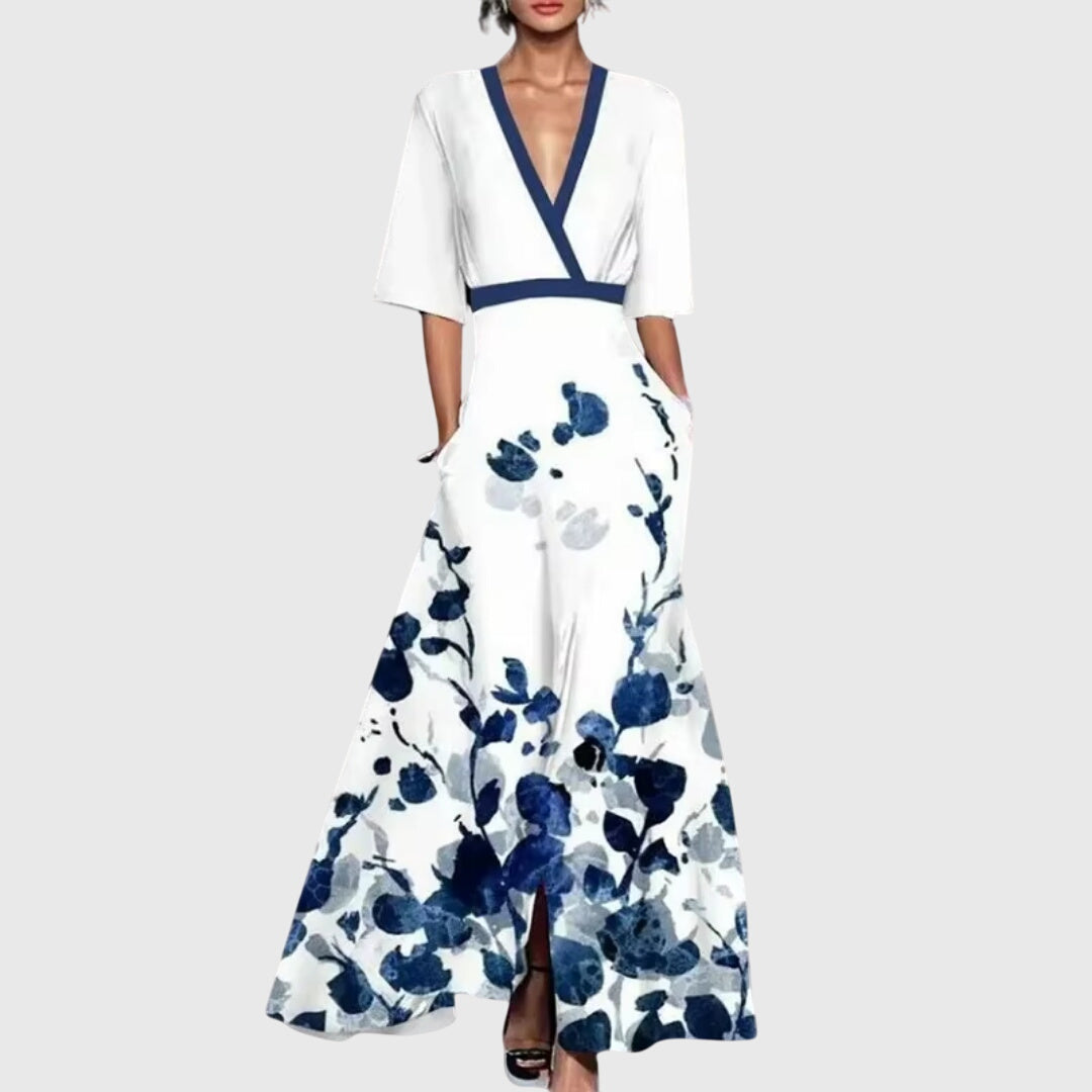 Elegant women's floral spring midi dress, flowy A-line cut in red, white & green print, perfect for parties.