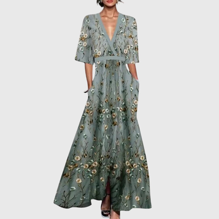 Flattering women's floral spring dress, elegant flowy A-line midi design, ideal for casual fashion or party wear.