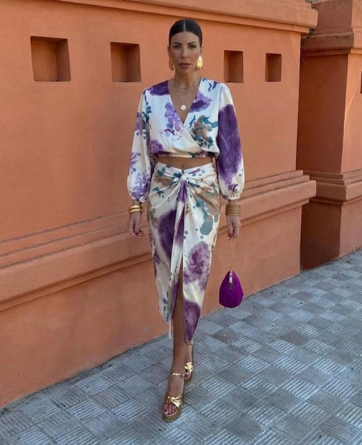 Elegant women's floral summer blouse & skirt set, a chic two-piece outfit. Perfect for warm-weather fashion.
