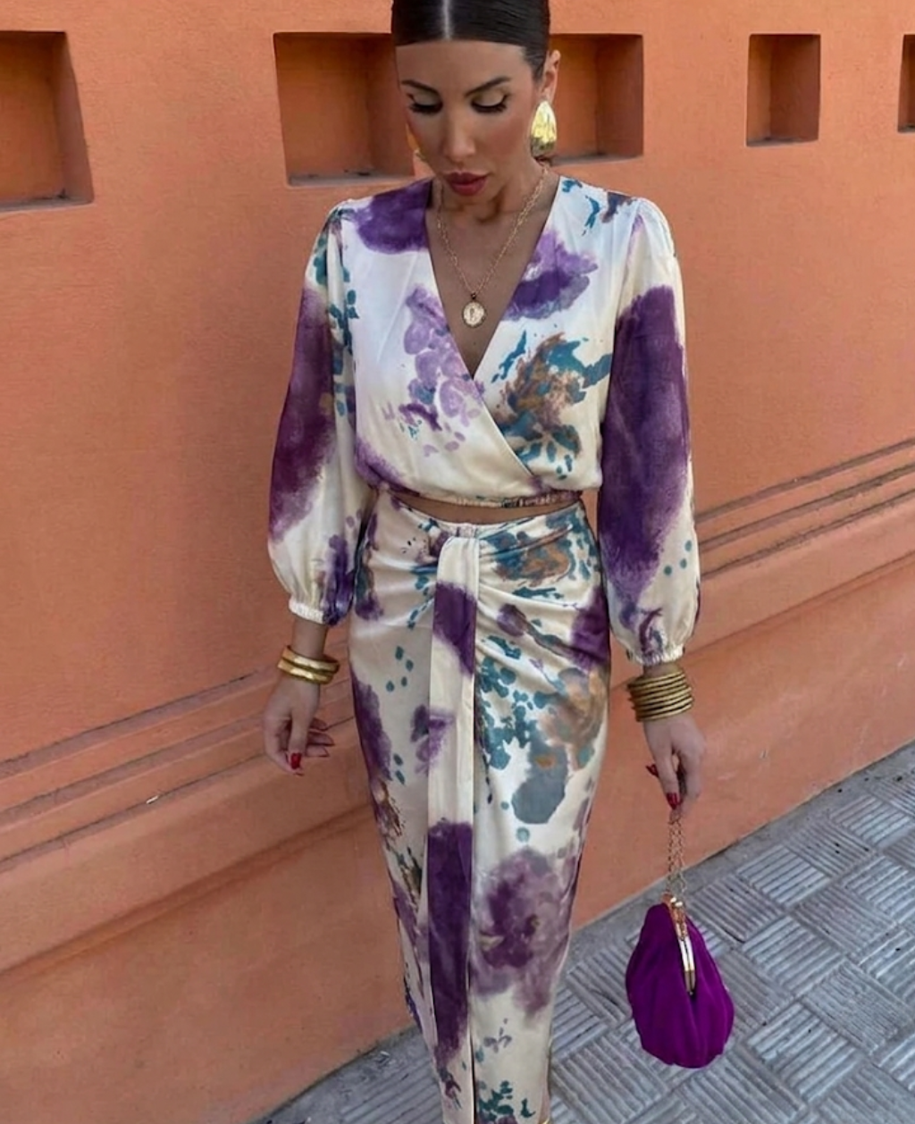 Fashionable women's floral summer blouse and high-waisted skirt set. Elegant two-piece outfit, perfect for sunny days.