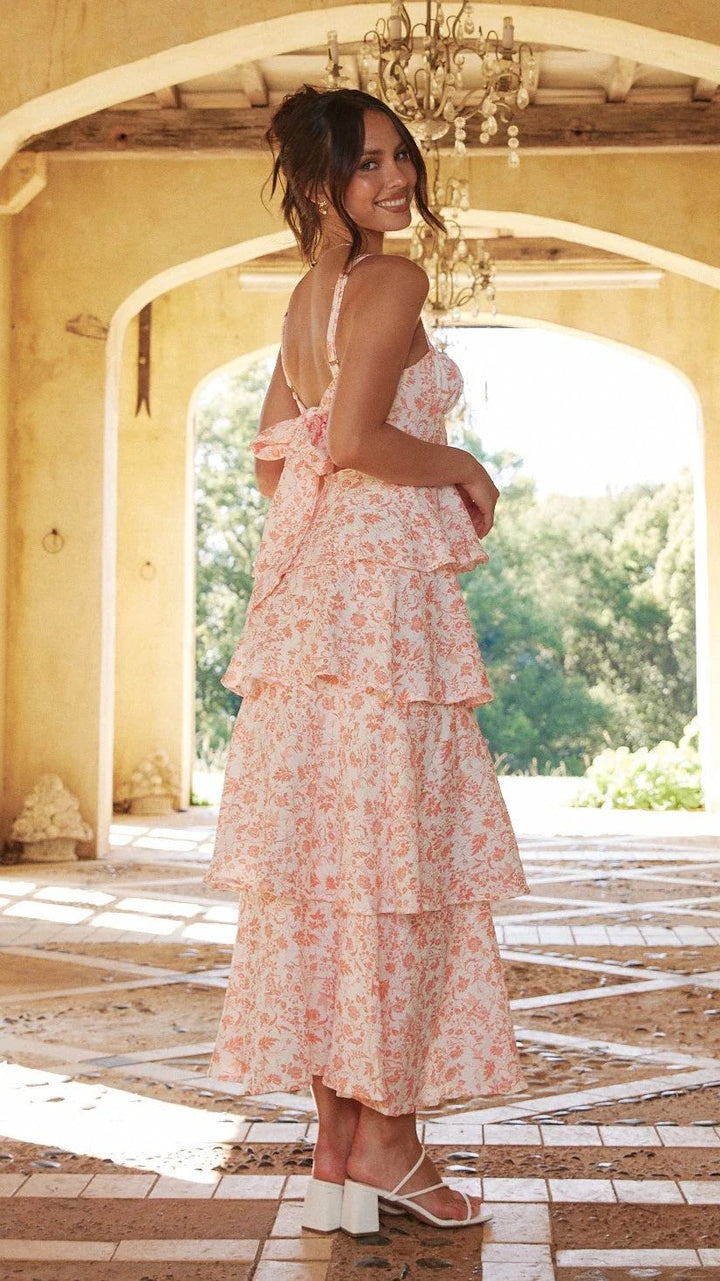 Chic women's floral tiered maxi dress, an ideal and elegant choice for any wedding guest attire.