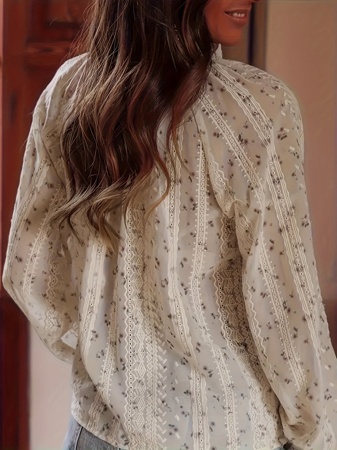 Comfortable & stylish women's V-neck blouse with vibrant floral print. Elegant feminine top, great for spring outfits.