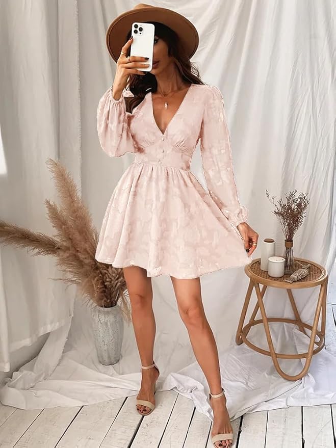Woman modeling a fashionable floral V-neck long sleeve cocktail dress, perfect for spring events.