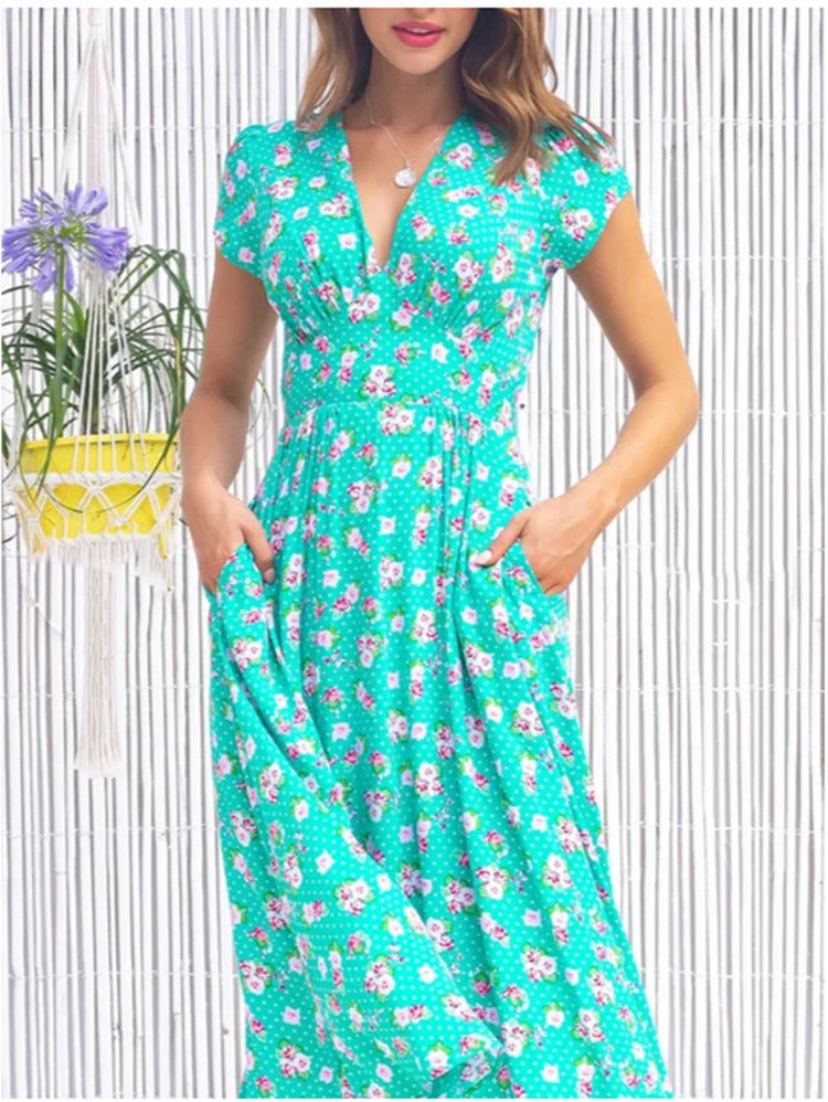 Flowy women's floral print midi dress, V-neck, short sleeve, ideal for vacation or elegant summer style.