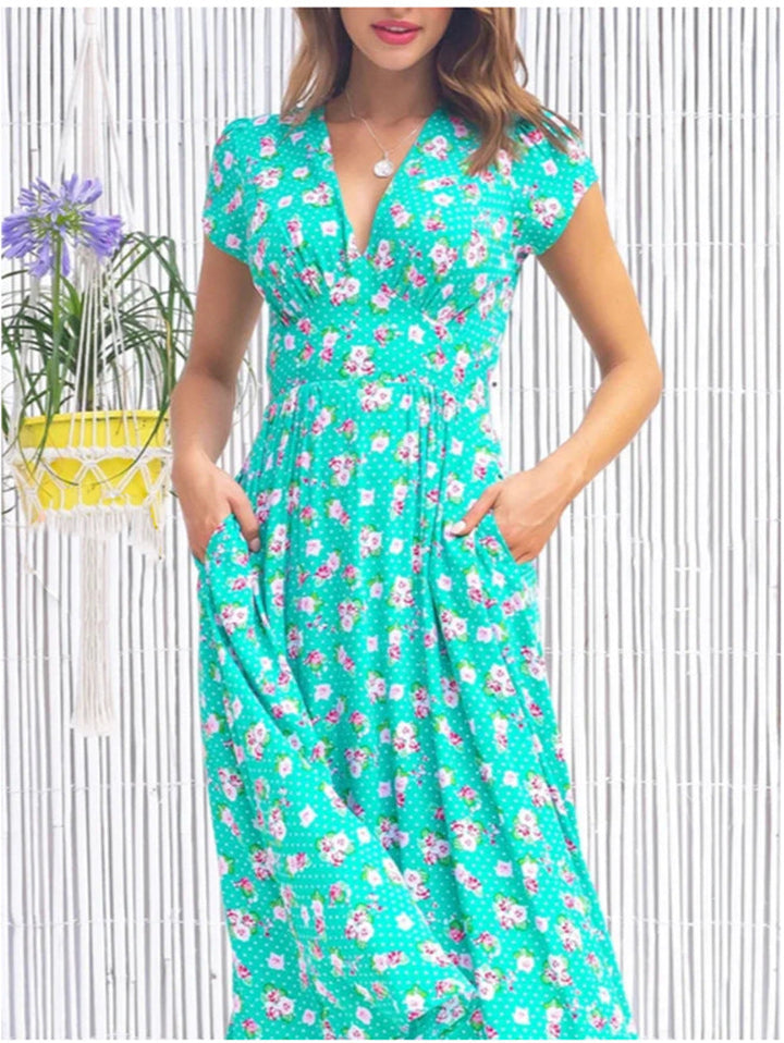 Flowy women's floral print midi dress, V-neck, short sleeve, ideal for vacation or elegant summer style.
